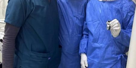 استخراج هاتف محمول من بطن مريض بعد 11 شهرا بمركز الجهاز الهضمي بالمنصورة - المصدر 7