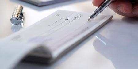 15 ألف شيك مرتجع الشهر الماضي بقيمة 80 مليون دينار - المصدر 7