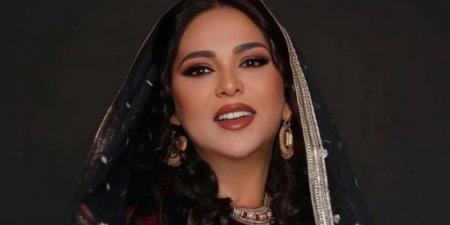 احتفال مفاجئ بعيد ميلاد نوال على متن الطائرة قبل حفلها في البحرين - المصدر 7